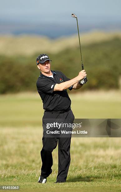 Former Australian cricket captain Steve Waugh plays his second shot to the 17th hole during the final round of The Alfred Dunhill Links Championship...