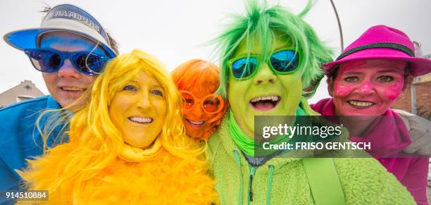 Fools celebrate in the streets of Damme near Osnabrueck, northern Germany, during a traditional carnival parade on February 5, 2018. The small town...