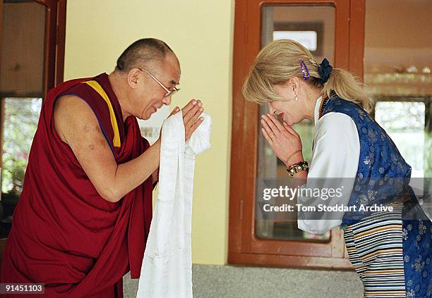 English actress Joanna Lumley greets His Holiness Tenzin Gyatso, The 14th Dalai Lama, during her visit to Dharamsala, India, May 2004.