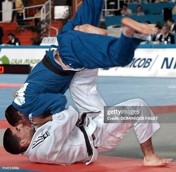 French 107 kg fights against Spanish Aytami Ruano 196 kg during the final of the second chance open category during the last day of the finals of the...