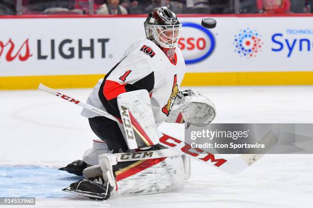 Ottawa Senators Goalie Mike Condon looks at the puck flying away at warm-up before the Ottawa Senators versus the Montreal Canadiens game on February...