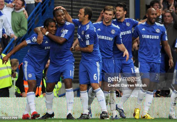 Florent Malouda of Chelsea celebrates after scoring the second goal with teammates Didier Drogba, Ricardo Carvalho, Branislav Ivanovic, Michael...