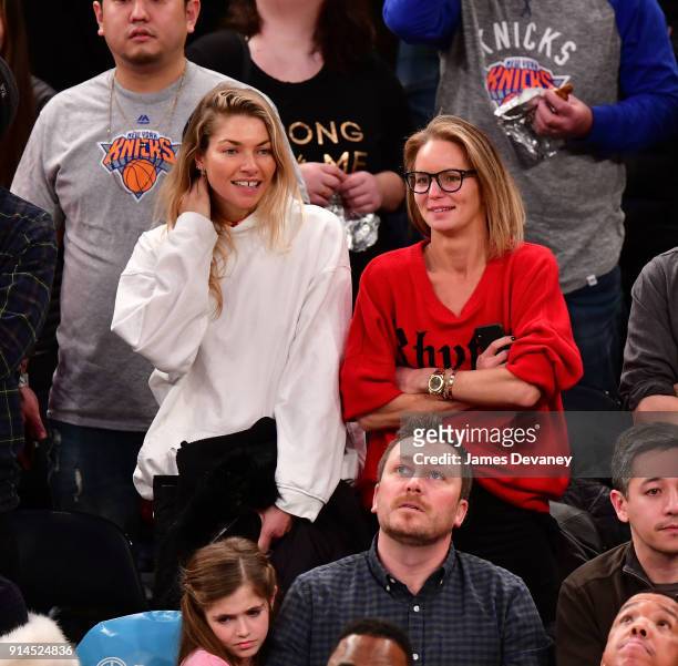 Jessica Hart and guest attend the New York Knicks vs Atlanta Hawks game at Madison Square Garden on February 4, 2018 in New York City.