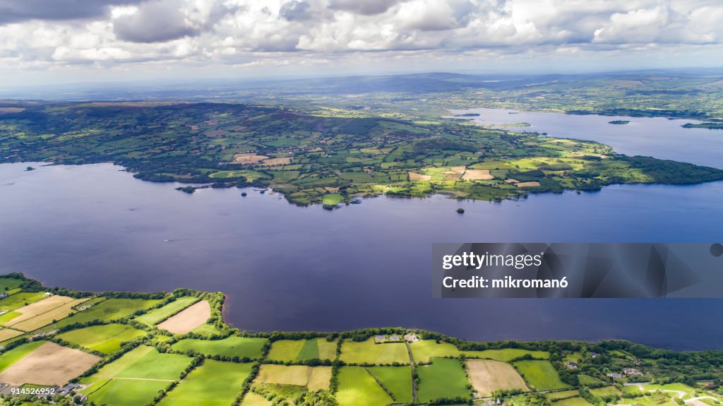 Summer, Irish day over Lough Derg lake and mountains, fields. Ireland