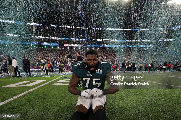 Vinny Curry of the Philadelphia Eagles celebrates after defeating the New England Patriots 41-33 in Super Bowl LII at U.S. Bank Stadium on February...
