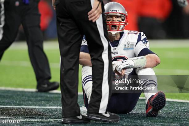 Tom Brady of the New England Patriots reacts against the Philadelphia Eagles during the fourth quarter in Super Bowl LII at U.S. Bank Stadium on...