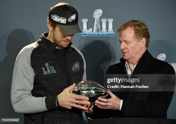 Commissioner Roger Goodell hands Nick Foles of the Philadelphia Eagles the Pete Rozelle Trophy as Super Bowl LII MVP during Super Bowl LII media...