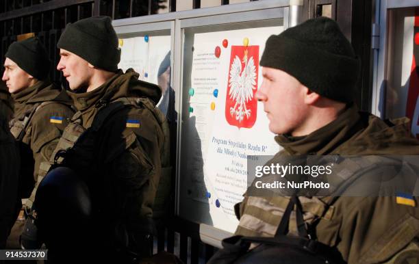 Ukrainian soldiers from National quard stand in line during a protest of Ukrainian nationalists from &quot;Freedom&quot; near the Polish Embassy in...