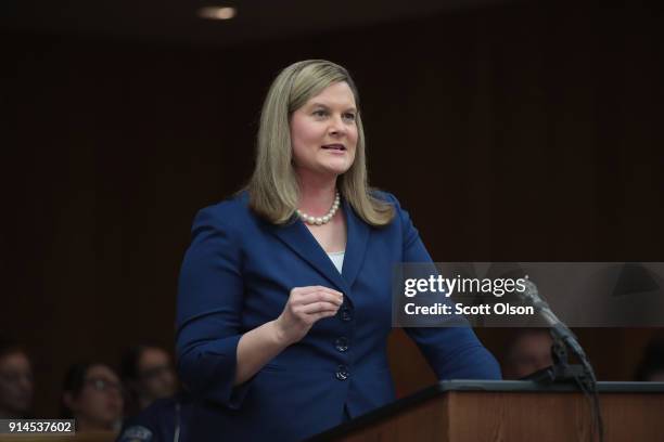 Assistant Attorney General Angela Povilaitis reads a statement at the sentencing hearing of Larry Nassar in Eaton County Circuit Court on February 5,...