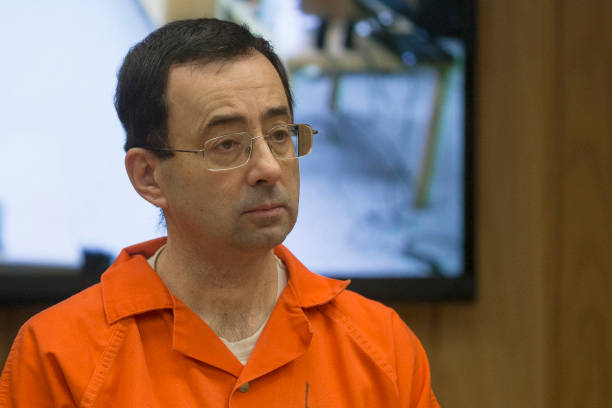 Former Michigan State University and USA Gymnastics doctor Larry Nassar appears in court for his final sentencing phase in Eaton County Circuit Court...