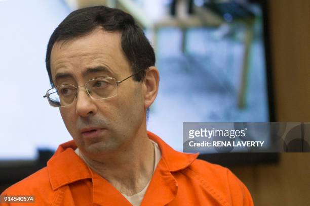 Former Michigan State University and USA Gymnastics doctor Larry Nassar appears in court for his final sentencing phase in Eaton County Circuit Court...