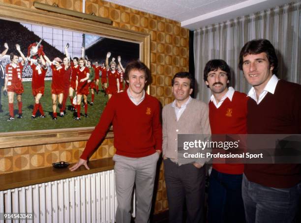 Liverpool footballers Phil Neal, Ian Callaghan, David Johnson and Ray Clemence pose for a photo inside Anfield, circa 1980.