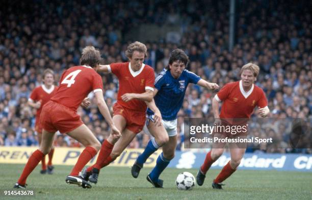 Phil Thompson , Phil Neal and Sammy Lee , all of Liverpool, crowd out Paul Mariner of Ipswich Town during a Football League Division One match at...