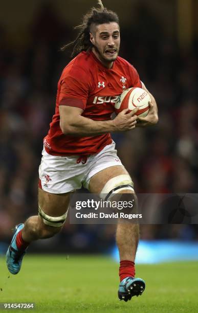 Josh Navidi of Wales runs with the ball during the NatWest Six Nations match between Wales and Scotland at the Principality Stadium on February 3,...