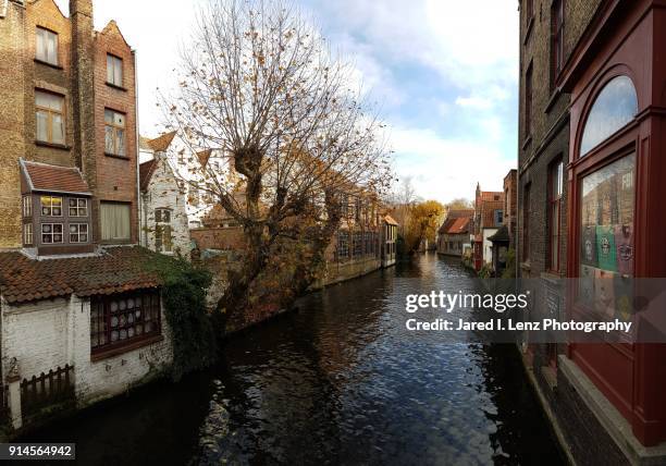 scenic waterway in bruges, belgium - canal disney stock pictures, royalty-free photos & images