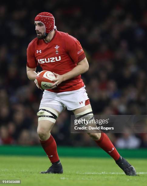 Cory Hill of Wales runs with the ball during the NatWest Six Nations match between Wales and Scotland at the Principality Stadium on February 3, 2018...