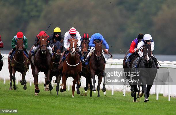 Mont Agel ridden by Jamie Spencer leads with the white cap to win the European Breeders Fund Maiden Stakes at Windsor Race course on October 5, 2009...