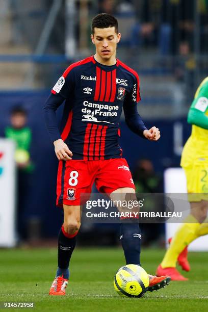 Caen's Belgian midfielder Stef Peeters runs with the ball during the French L1 football match between Caen and Nantes on February 4 at Michel...