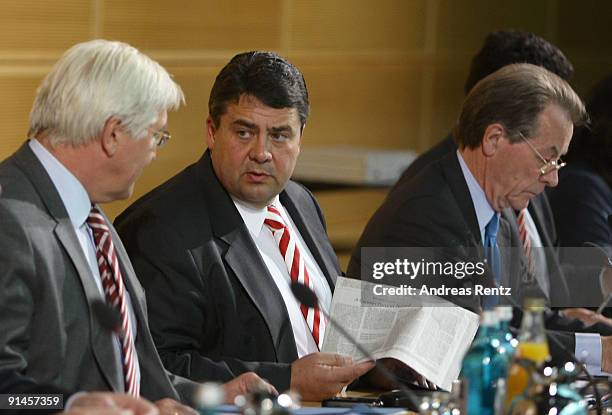 Current German Foreign Minister Frank-Walter Steinmeier and leader of the SPD parliamentary group, Sigmar Gabriel, current Environment Minister and...