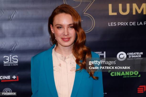 French actress Laetitia Dosch, nominated best female newcomer for the film "Jeune Femme", poses during a photocall upon arrival to attend the 23rd...