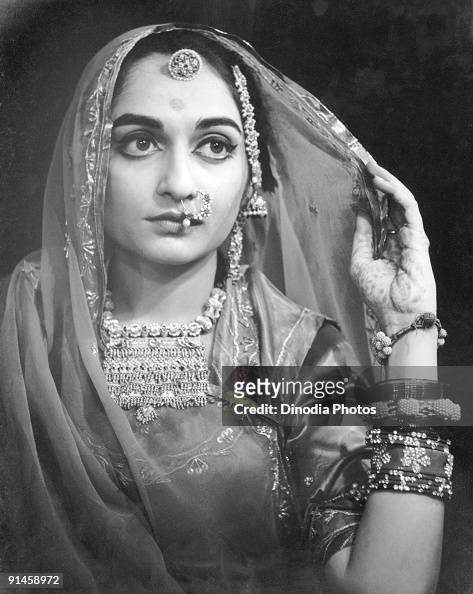An Indian bride in Rajasthan, 1940s. Her hand is decorated with... News ...