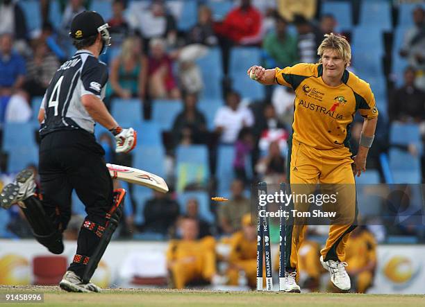 Neil Broom of New Zealand is run out by Shane Watson of Australia during the ICC Champions Trophy Final between Australia and New Zealand played at...