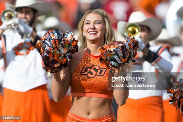 Oklahoma State Cowboys cheerleader during the Big 12 conference college Bedlam rivalry football game between the Oklahoma Sooners and the Oklahoma...