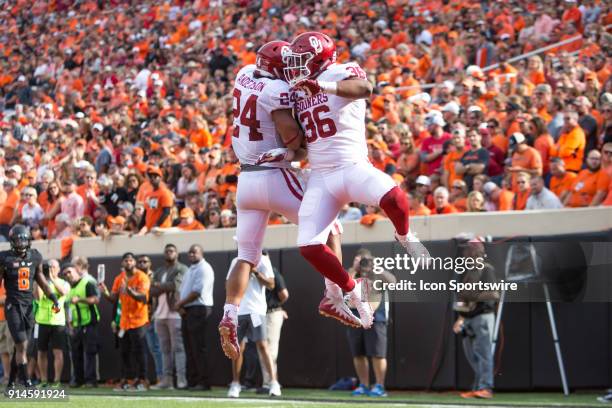 Oklahoma Sooners fullback Dimitri Flowers and Oklahoma Sooners running back Rodney Anderson celebrate in the end zone during the Big 12 conference...