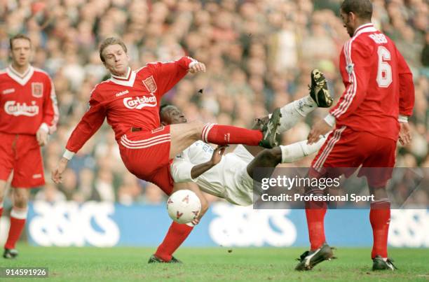 Tony Yeboah of Leeds United attempts an overhead kick whilst being challenged by John Scales and Phil Babb of Liverpool during an FA Cup Quarter...