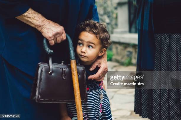 grandmother and granddaughter outside - grandma cane stock pictures, royalty-free photos & images