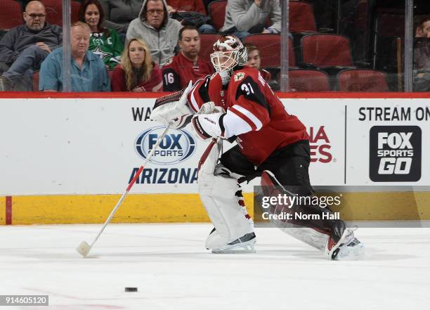 Scott Wedgewood of the Arizona Coyotes skates after the puck against the Dallas Stars at Gila River Arena on February 1, 2018 in Glendale, Arizona.