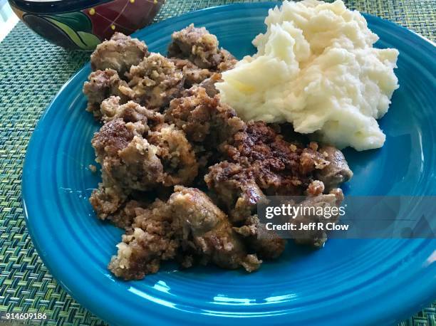 chicken livers and gizzards in the south - animal liver stock pictures, royalty-free photos & images