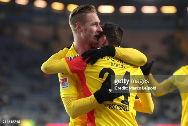 Sebastian Polter and Steven Skrzybski of 1 FC Union Berlin celebrate after scoring the opening goal during the Second Bundesliga match between DSC...