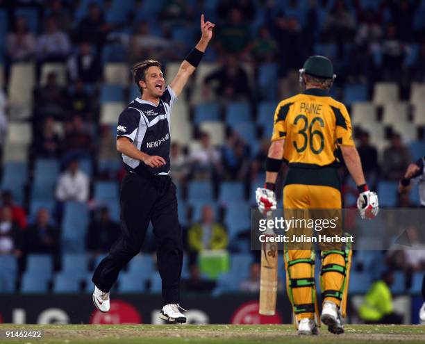 Shane Bond of New Zealand celebrates the dismissal of Tim Paine during the ICC Champions Trophy Final between Australia and New Zealand played at...