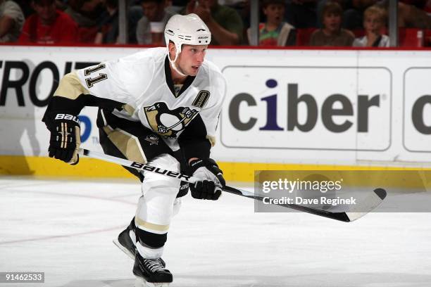 Jordan Staal of the Pittsburgh Penguins skates up ice during a NHL pre-season game against the Detroit Red Wings at Joe Louis Arena on September 27,...