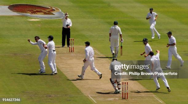 England bowler Graeme Swann celebrates the wicket of South African batsman JP Duminy during the 3rd Test match between South Africa and England at...