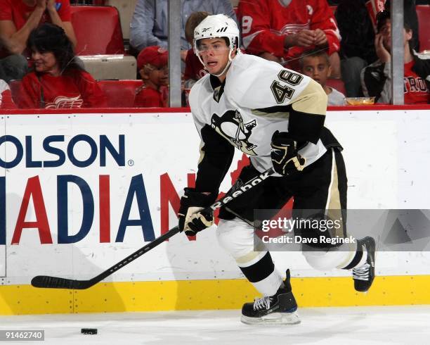 Tyler Kennedy of the Pittsburgh Penguins skates up ice with the puck during a NHL pre-season game against the Detroit Red Wings at Joe Louis Arena on...