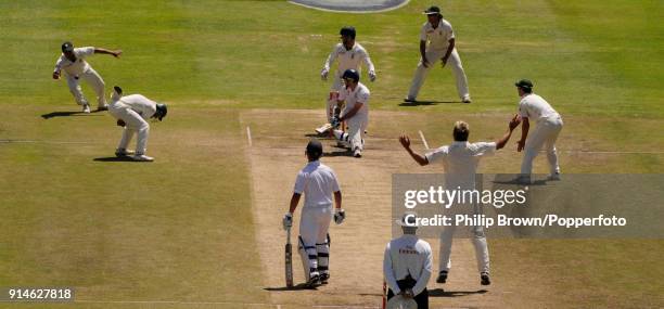 Ashwell Prince of South Africa dives to take the catch to dismiss England batsman James Anderson off the bowling of Paul Harris during the 3rd Test...