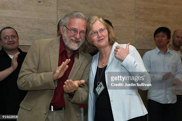 University of California San Francisco scientist Elizabeth Blackburn talks with a colleague as she receives applauds and cheers while celebrating...