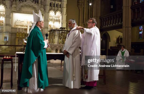 New Sanctuary movement activist Ravi Ragbir receives a "Bishop's Cross" and the official protection of the Episcopal Church at a ceremony on February...