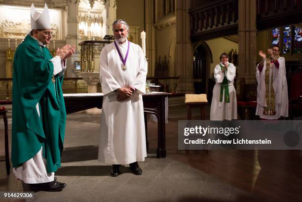 New Sanctuary movement activist Ravi Ragbir receives a "Bishop's Cross" and the official protection of the Episcopal Church at a ceremony on February...