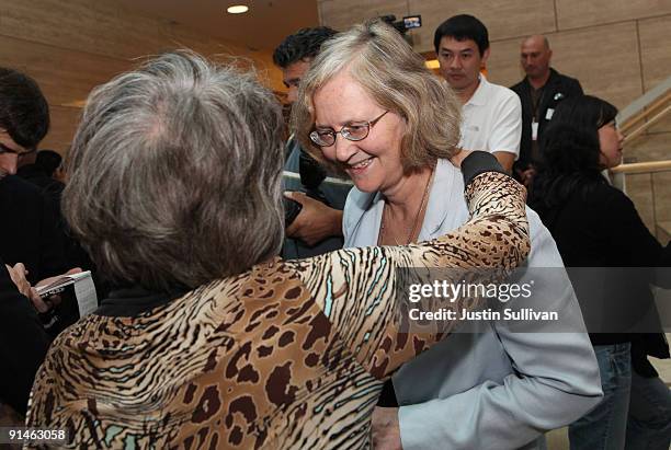 University of California San Francisco scientist Elizabeth Blackburn is greeted by a UCSF colleague after winning the Nobel Prize in Medicine October...