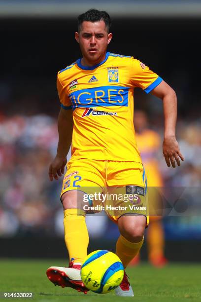 Israel Jimenez of Tigres drives the ball during the 5th round match between Pumas UNAM and Tigres UANL as part of the Torneo Clausura 2018 Liga MX at...