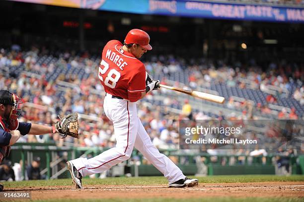 Mike Morse#28 of the Washington Nationals takes a swing during a baseball game against the Atlanta Braves on September 27, 2009 at Nationals Park in...