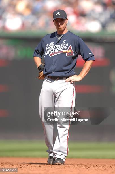 Adam LaRoche of the Atlanta Braves looks on during a baseball game against the Washington Nationals on September 27, 2009 at Nationals Park in...