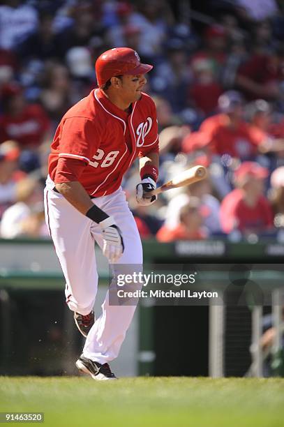 Mike Morse of the Washington Nationals takes a swing during a baseball game against the Atlanta Braves on September 27, 2009 at Nationals Park in...