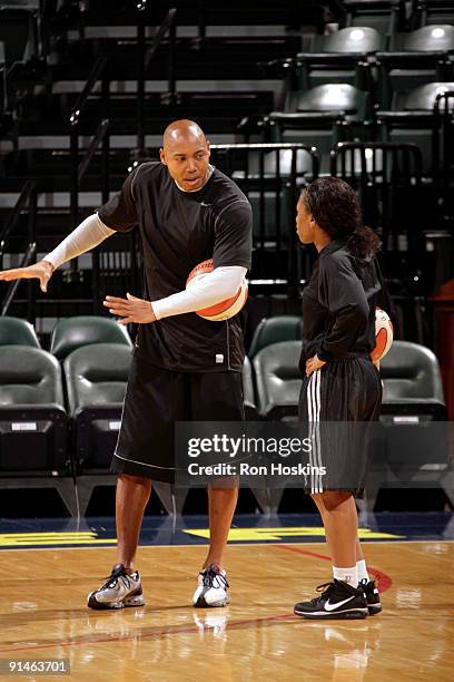 Head coach Corey Gaines speaks to Temeka Johnson of the Phoenix Mercury during practice after Game Three of the WNBA Finals on October 5, 2009 at...