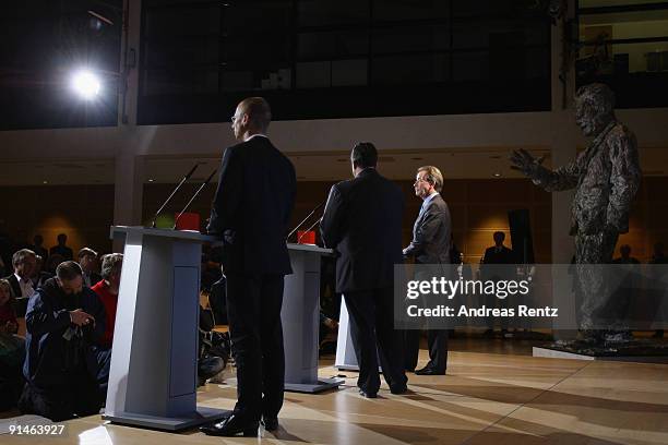 Outgoing Chairman Franz Muentefering of the German Social Democrats and Sigmar Gabriel adresses the media during a press conference following a...