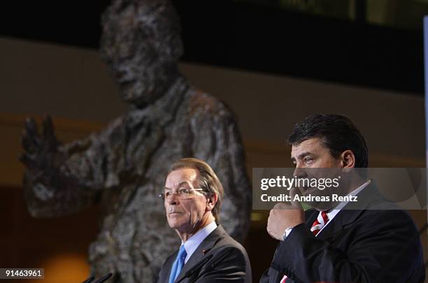 Outgoing Chairman Franz Muentefering of the German Social Democrats and Sigmar Gabriel adresses the media during a press conference following a...