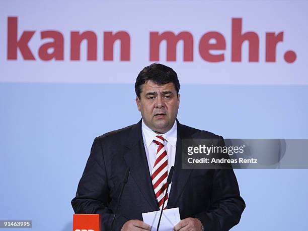 Sigmar Gabriel adresses the media during a press conference following a meeting of the party's executive committee at Willy-Brandt-Haus on October 5,...